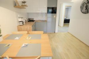 Kuchyňa alebo kuchynka v ubytovaní Apartment BazaTatry Parkowy