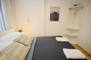 Posteľ alebo postele v izbe v ubytovaní Apartment BazaTatry Parkowy