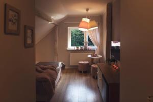Posezení v ubytování Apartamenty Willove Wzgórze