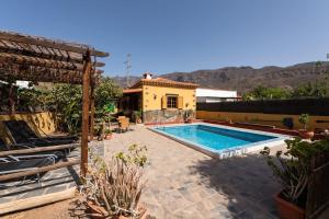 Bazén v ubytování La Almendra nebo v jeho okolí