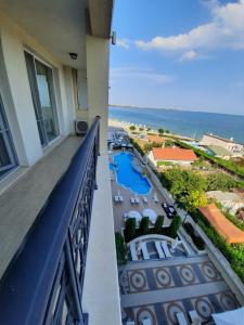 a view of the ocean from the balcony of a hotel at Private Super apartments by sea in Apart Hotel ! in Pomorie