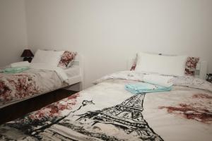 Ein Bett oder Betten in einem Zimmer der Unterkunft Apartman Lucija & Luka