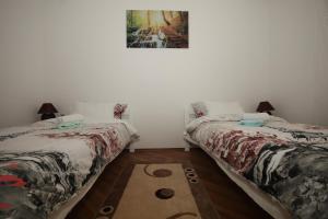 Ein Bett oder Betten in einem Zimmer der Unterkunft Apartman Lucija & Luka