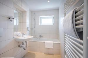 Koupelna v ubytování Boutique Hotel Erb München Parsdorf