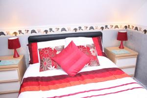 A bed or beds in a room at The Ryecroft 