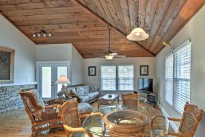 a living room with a couch and a table at Rita's Sand Key Gem in Clearwater Beach