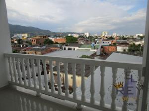 a balcony with a view of a city at Hotel Rey David in Yopal
