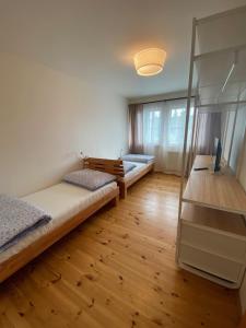 Posteľ alebo postele v izbe v ubytovaní Apartmány Lipno 46