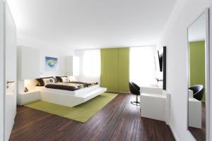 Postel nebo postele na pokoji v ubytování Hotel Barth