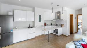 Kuchyňa alebo kuchynka v ubytovaní Maka beach apartment v