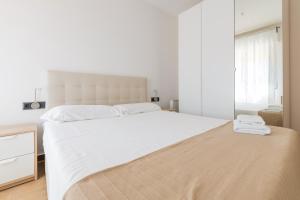 Posteľ alebo postele v izbe v ubytovaní Maka beach apartment v