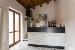 a kitchen with a counter top in a room at Albergo Diffuso Amatrice in Amatrice
