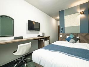 TV a/nebo společenská místnost v ubytování Hotel Areaone Tokai
