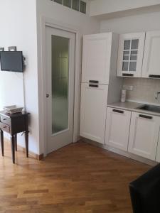 Kuchyň nebo kuchyňský kout v ubytování Grazioso appartamento in Centro a Numana + 3 fotografie