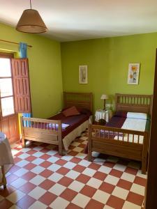Кровать или кровати в номере Casa Rural Hotel La Placeta AYORA