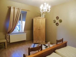 Postel nebo postele na pokoji v ubytování ZU DEN LINDEN - RADEBEUL Pension mit Restaurant