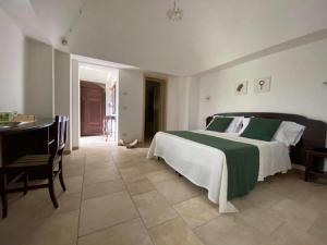 Postel nebo postele na pokoji v ubytování Il Palmento Hotel Relais