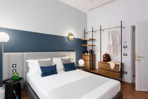 Postel nebo postele na pokoji v ubytování M20 Boutique Hotel
