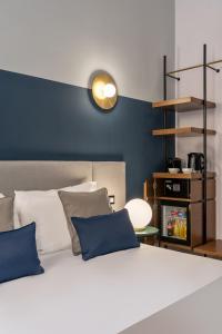 Postel nebo postele na pokoji v ubytování M20 Boutique Hotel