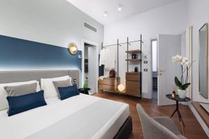 Postel nebo postele na pokoji v ubytování M20 Boutique Hotel