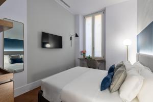 Postel nebo postele na pokoji v ubytování M20 Boutique Hotel