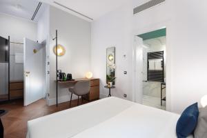 Postel nebo postele na pokoji v ubytování M20 Boutique Hotel