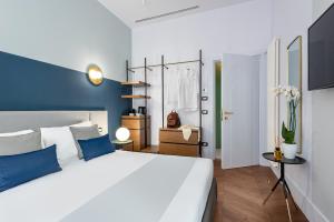 Postel nebo postele na pokoji v ubytování M20 Boutique Hotel