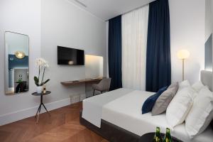 Postel nebo postele na pokoji v ubytování M20 Boutique Hotel