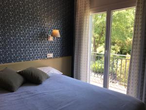 Postel nebo postele na pokoji v ubytování Hotel Esteba