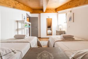 Postel nebo postele na pokoji v ubytování Apartment Belvedere 5 - Tremezzina