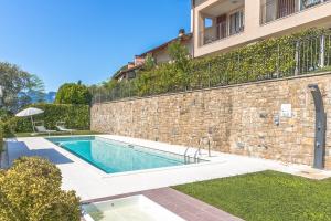 Bazén v ubytování Apartment Belvedere 5 - Tremezzina nebo v jeho okolí