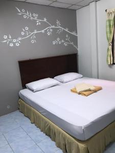 Postel nebo postele na pokoji v ubytování Phang Nga Guesthouse