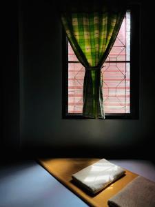 Postel nebo postele na pokoji v ubytování Phang Nga Guesthouse