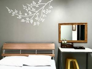 Postel nebo postele na pokoji v ubytování Phang Nga Guesthouse