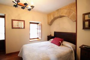 Postel nebo postele na pokoji v ubytování Casa de Aldea Peña Sobia