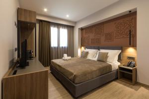 Giafra Luxury Rooms客房内的一张或多张床位
