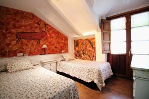 Postel nebo postele na pokoji v ubytování Casa de Aldea Peña Sobia