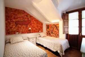 Postel nebo postele na pokoji v ubytování Casa de Aldea Peña Sobia