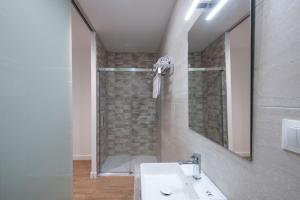 Koupelna v ubytování Hostal Beach