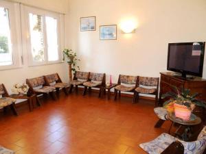 TV a/nebo společenská místnost v ubytování Hotel Parma Mare