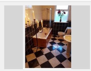 Ванна кімната в Belmullet View Holiday Accommodation