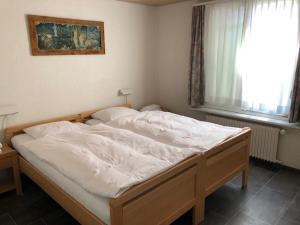 Postel nebo postele na pokoji v ubytování Hotel Hippel Krone