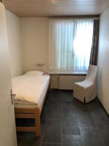 Postel nebo postele na pokoji v ubytování Hotel Hippel Krone