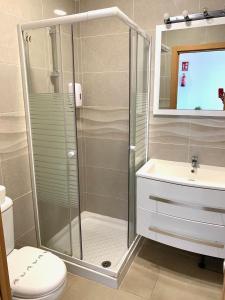 Ein Badezimmer in der Unterkunft Neptuno Beachfront Apartments