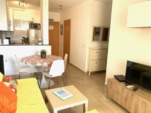 Küche/Küchenzeile in der Unterkunft Neptuno Beachfront Apartments