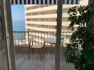 Ein Balkon oder eine Terrasse in der Unterkunft Neptuno Beachfront Apartments