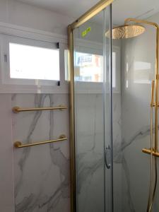 Ein Badezimmer in der Unterkunft Neptuno Beachfront Apartments