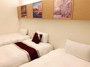מיטה או מיטות בחדר ב-Cloud Villa
