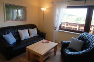 Posezení v ubytování Ferienwohnung Woelfel