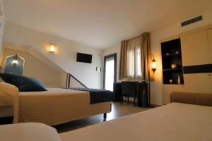 RIAD Comfort Rooms客房内的一张或多张床位